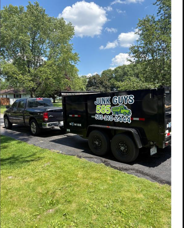 Junk Guys 585 dump trailer and truck on a Rochester job
